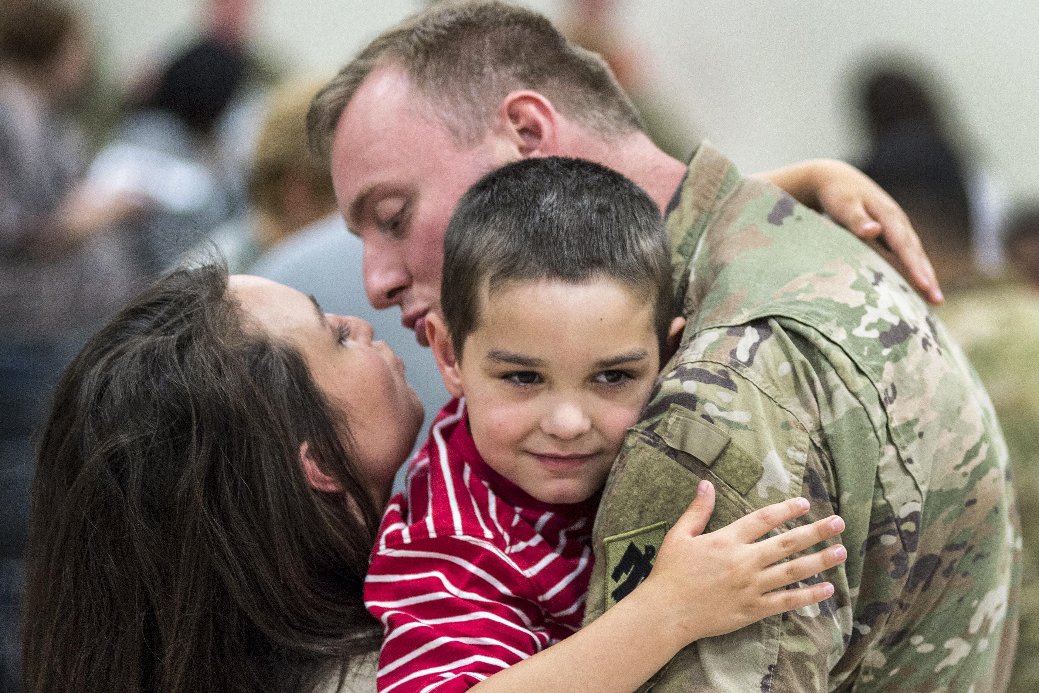 A soldier was welcomed by Family so lovely