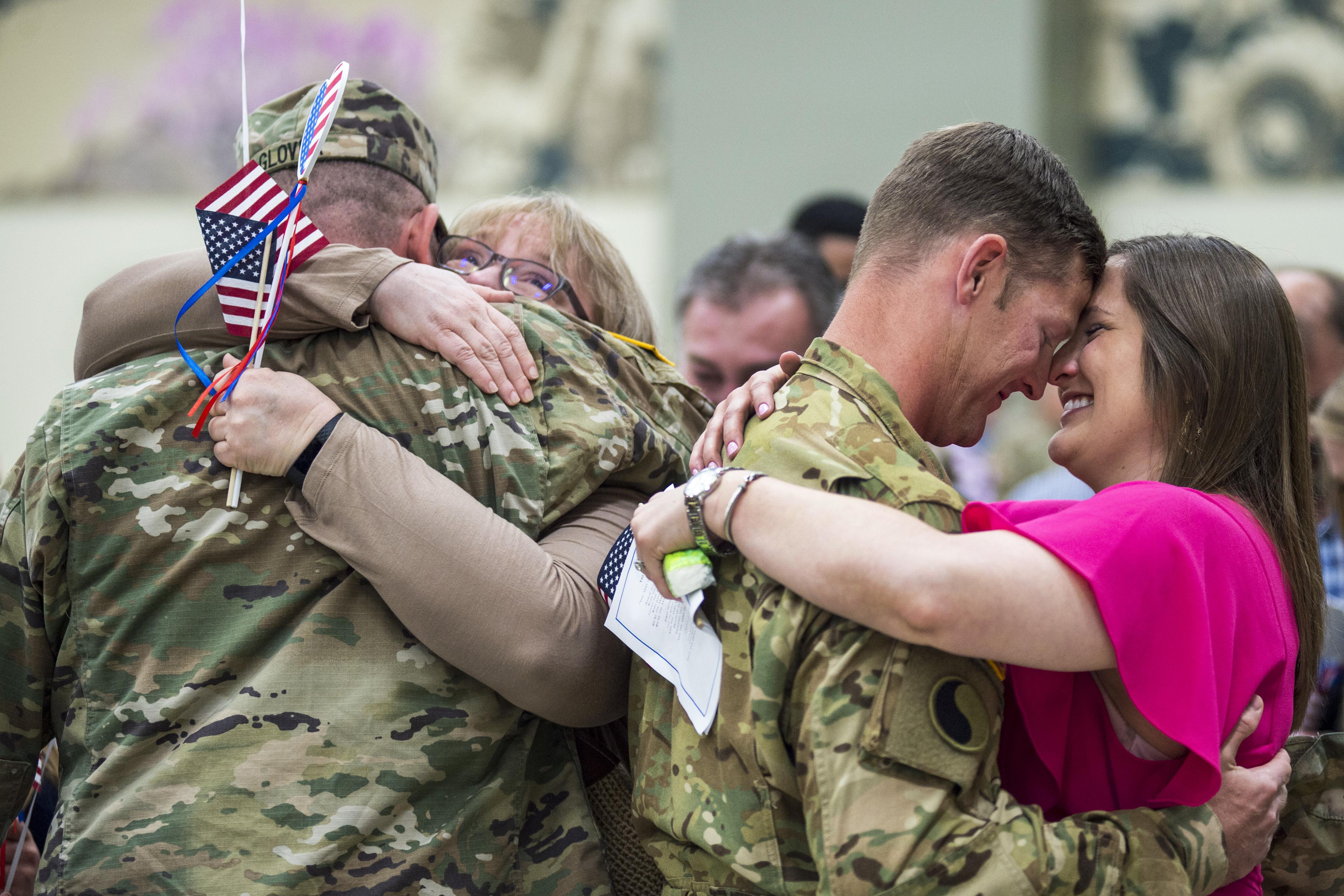 Joyful moment of a returning Soldier and lovers